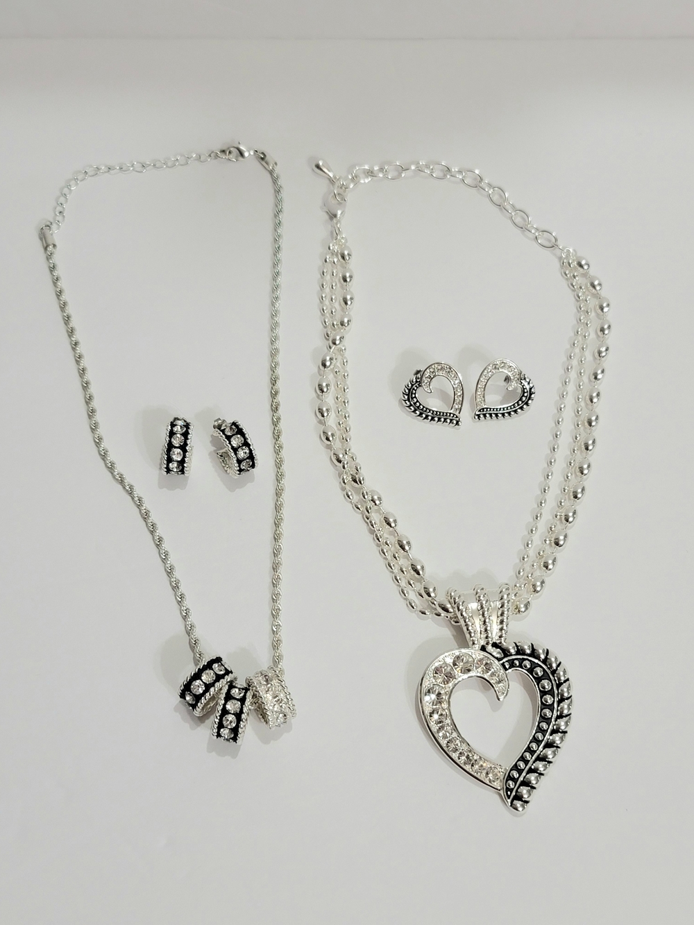 Silver Toned Pendant Necklace and Earring Sets